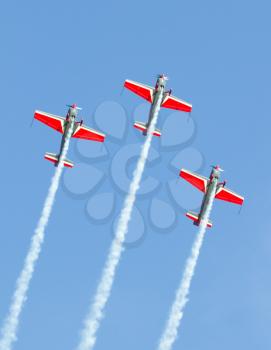 LEEUWARDEN,FRIESLAND,HOLLAND-SEPTEMBER 17: Royal Jordanian Falcons Display Team in their Extra 300L aircraft at the Airshow on September 17, 2011 at Leeuwarden Airfield