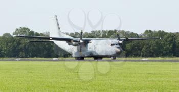 LEEUWARDEN,FRIESLAND,HOLLAND-SEPTEMBER 17: A C-130 Hercules military airplane at the Luchtmachtdagen Airshow on September 17, 2011 at Leeuwarden Airfield,Friesland,Holland