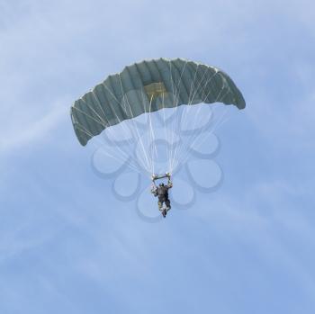 LEEUWARDEN,FRIESLAND,HOLLAND-SEPTEMBER 17: Two parachutists of the dutch army at the Airshow on September 17, 2011 at Leeuwarden Airfield
