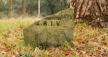 A broken gravestone on an old jewish graveyard