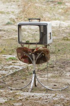 Grungy old TV set without a screen (Holland)