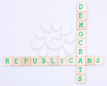 Democrats and republicans spelled in a crossword on a white background