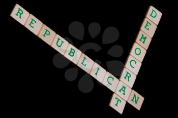 Democrat and republican spelled in a crossword on a black background