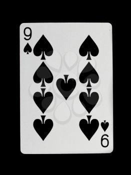 Playing card (nine) isolated on a black background