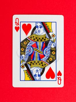 Playing card (queen) isolated on a red background