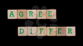 Letters on old wooden blocks (agree, differ)