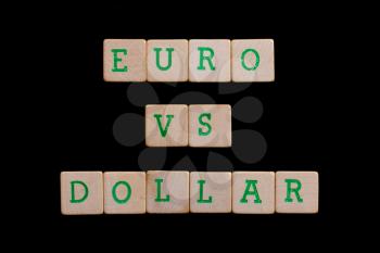 Letters on wooden blocks (euro, dollar)