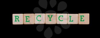 Green letters on old wooden blocks (recycle)