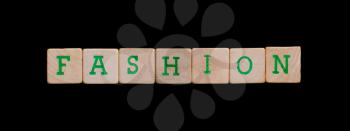 Green letters on old wooden blocks (fashion)