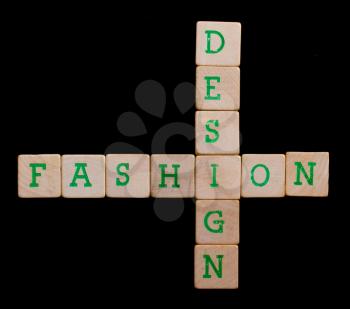 Green letters on old wooden blocks (design, fashion)