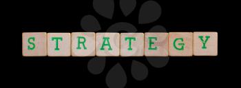 Green letters on old wooden blocks (strategy)