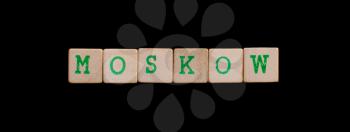 Moskow spelled out in old wooden blocks