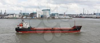 ROTTERDAM, THE NETHERLANDS - JUNE 22: Small chemical tanker sailing in the port of Rotterdam (Holland), Rotterdam, June 22, 2012