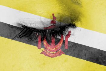 Crying woman, pain and grief concept, flag of Brunei