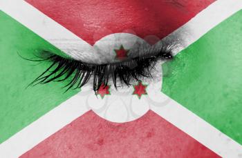Crying woman, pain and grief concept, flag of Burundi