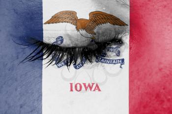 Crying woman, pain and grief concept, flag of Iowa