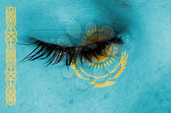 Crying woman, pain and grief concept, flag of Kazakhstan