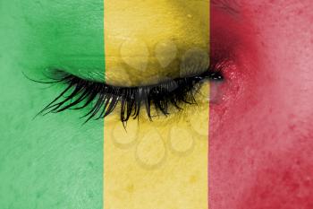 Crying woman, pain and grief concept, flag of Mali