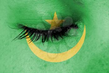 Crying woman, pain and grief concept, flag of Mauritania
