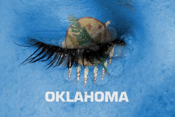 Crying woman, pain and grief concept, flag of Oklahoma