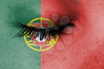 Crying woman, pain and grief concept, flag of Portugal