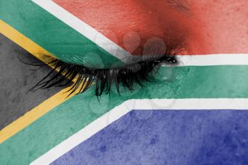 Crying woman, pain and grief concept, flag of South Africa