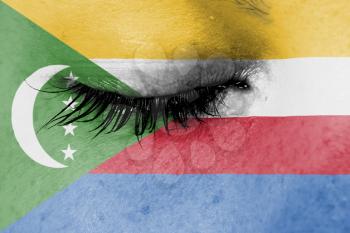 Crying woman, pain and grief concept, flag of the Comoros