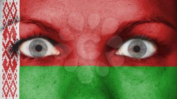 Close up of eyes. Painted face with flag of Belarus