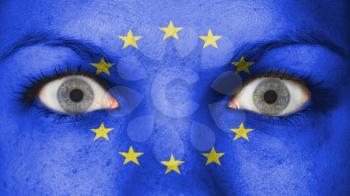 Close up of eyes. Painted face with flag of European Union