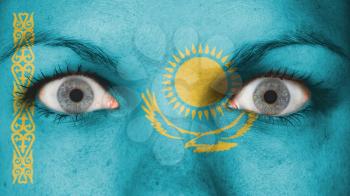Close up of eyes. Painted face with flag of Kazakhstan