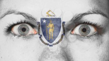 Close up of eyes. Painted face with flag of Massachusetts