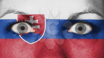 Close up of eyes. Painted face with flag of Slovakia