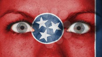 Close up of eyes. Painted face with flag of Tennessee