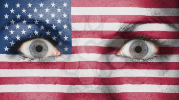 Close up of eyes. Painted face with flag of United States of America