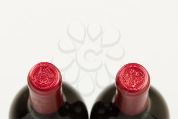 Two bottles of wine isolated on white background