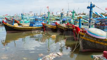 Fishing boats in a harbour in Vietnam