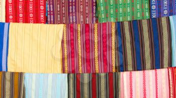 Silk scarfs on display in a silk factory in Vietnam