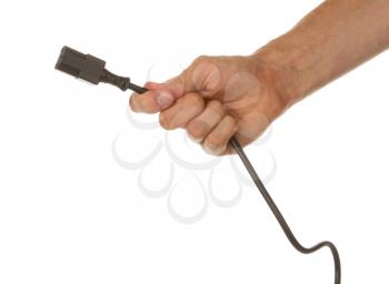 Man is holding a black outlet in the hand isolated on a white background