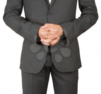 Business man in grey suit praying, isolated on white