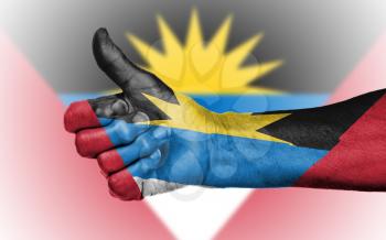 Old woman giving the thumbs up sign, isolated, flag of Antigua and Barbuda