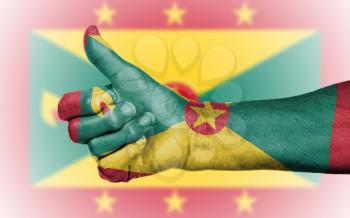 Old woman giving the thumbs up sign, isolated, flag of Grenada