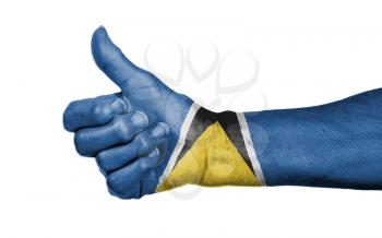 Old woman giving the thumbs up sign, isolated, flag of Saint Lucia