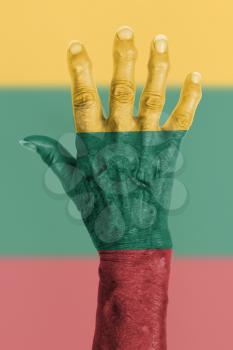 Isolated old hand with flag, European Union, Lithuania