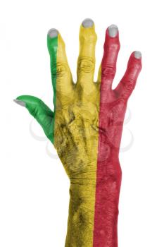 Hand of an old woman wrapped in flag of Mali