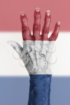 Isolated old hand with flag, European Union, Netherlands