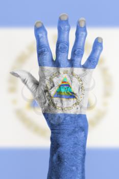 Hand of an old woman with arthritis, isolated on white, Nicaragua