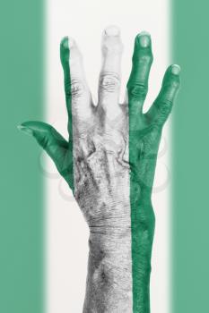 Hand of an old woman with arthritis, isolated on white, Nigeria