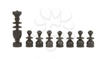 Set of old handcarved chess pieces isolated on a white background