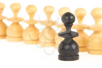 Old handcarved chess pieces isolated on white background