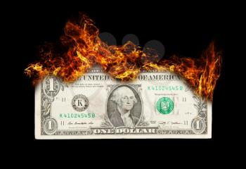 Burning dollar bill symbolizing careless money management and the phrase money to burn